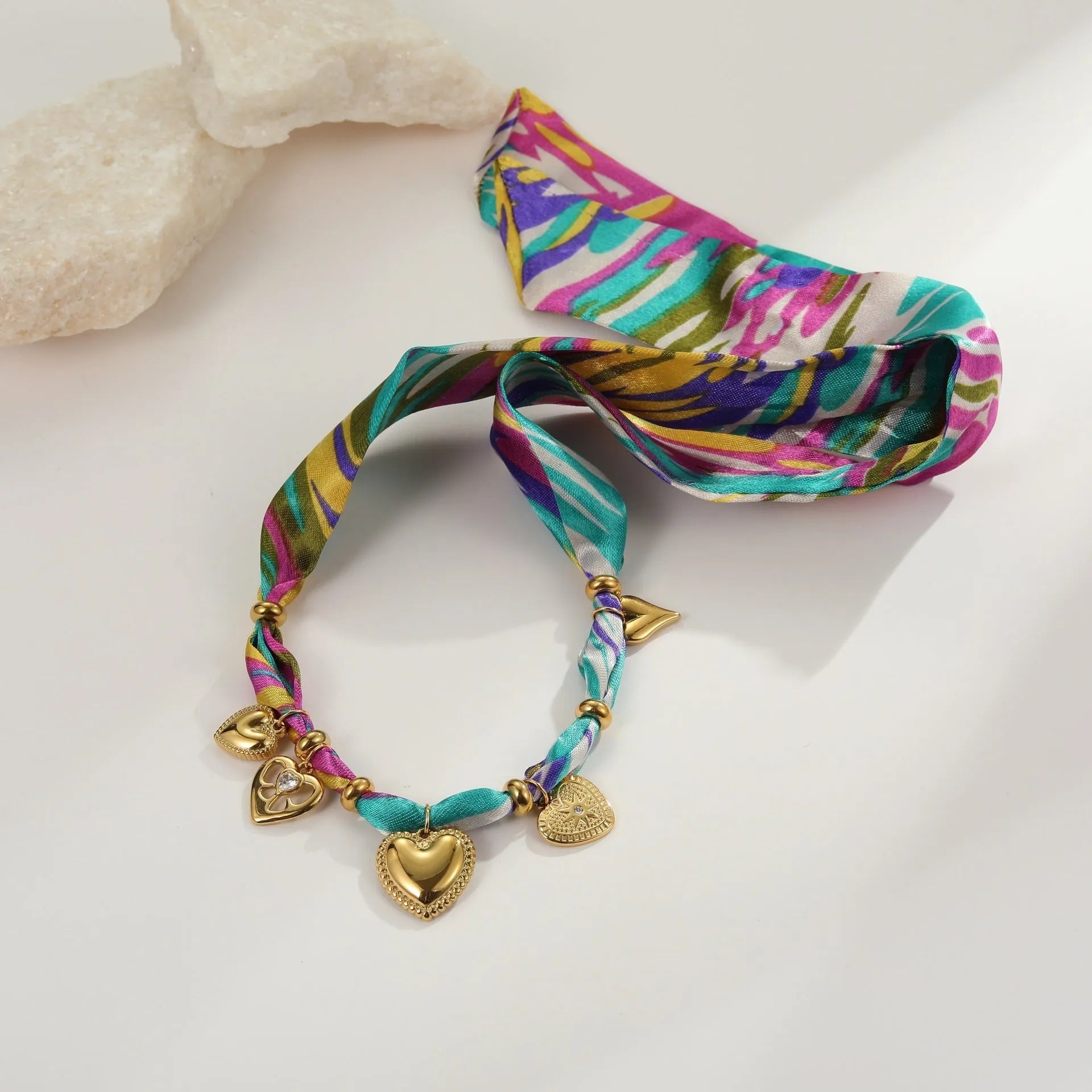 Women's stainless steel necklace with geometric pendant and 18K gold plating