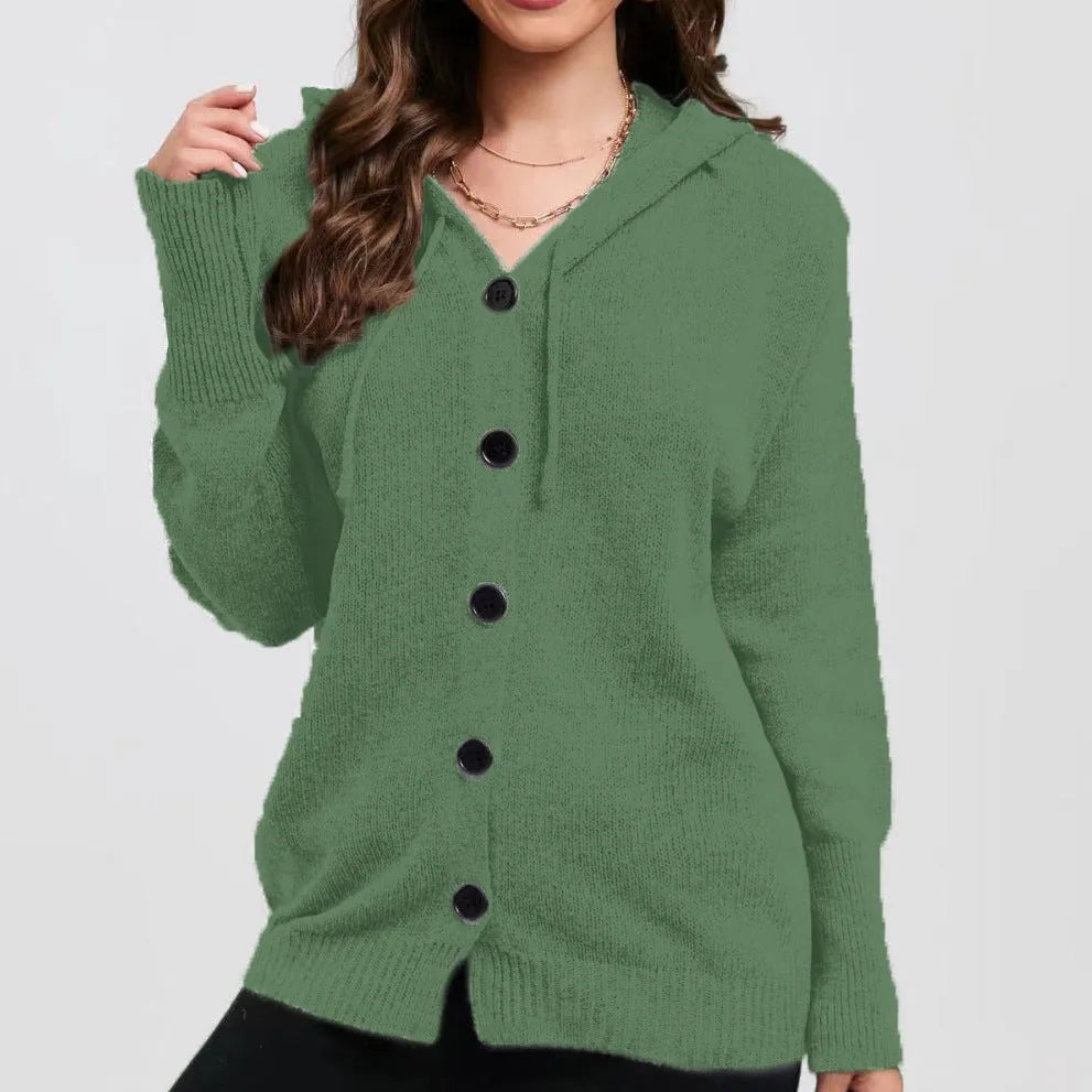 Women's solid colour loose-fit hooded cotton cardigan sweater on a hanger.