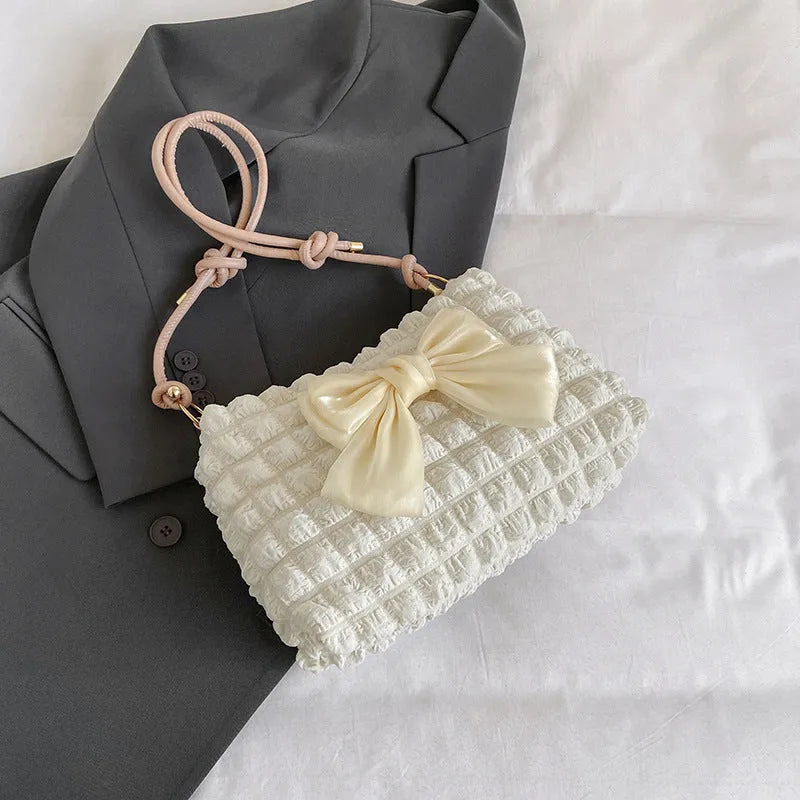 Women's one-shoulder canvas handbag in horizontal square shape with single strap
