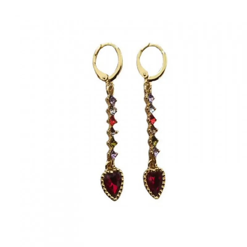 Women's heart-shaped alloy earrings with a shiny electroplated finish in gold and silver colours.