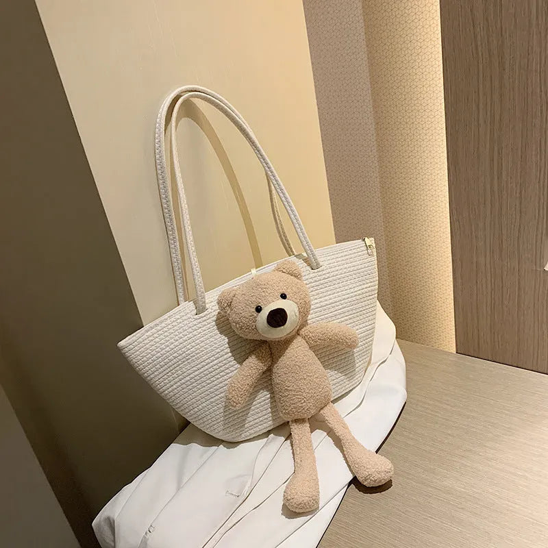 Cotton and linen woven bag with dumpling shape design and double shoulder straps in six colour options
