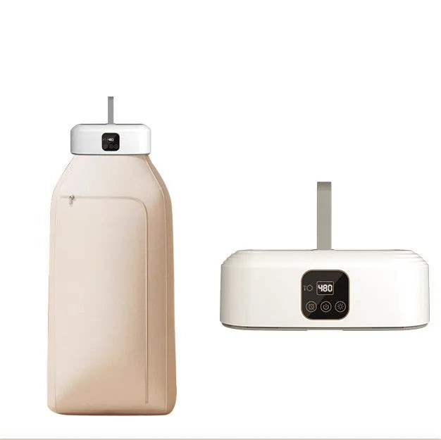 White cylindrical compact laundry dryer with remote control for small space drying