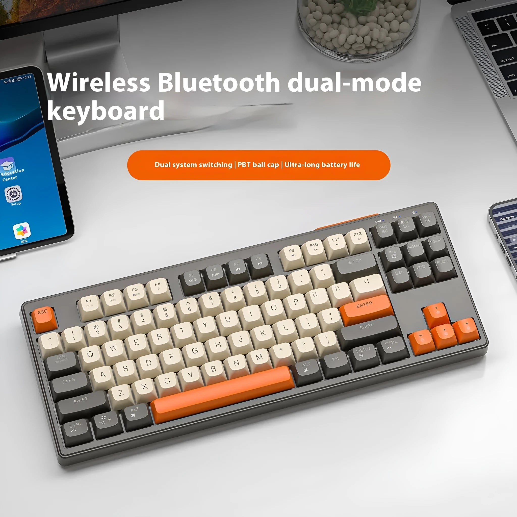 Free Wolf M87 wireless Bluetooth keyboard in blueberry colour on a desk with USB receiver and cable.