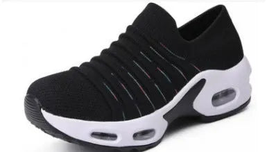 Women's plus size fly-knit socks shoes in dark blue with mesh upper and low heel, showing round toe design.