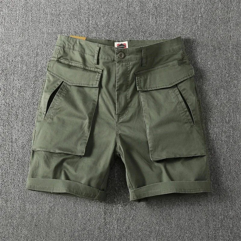 Men's straight-leg cotton cargo shorts in army green with multiple pockets on the legs.