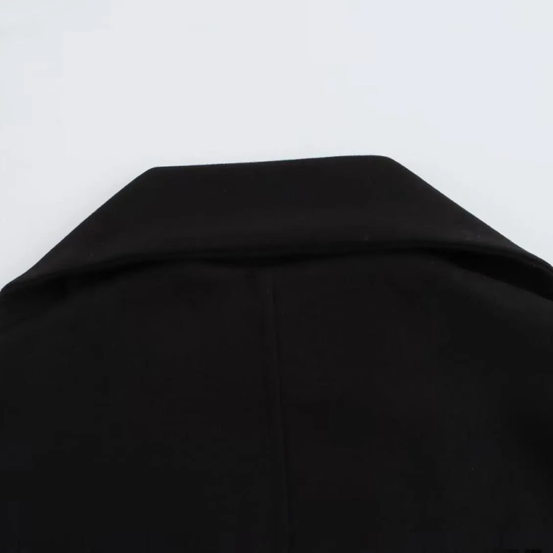 Women's long black overcoat with artificial fur collar, pockets and extended 100cm length