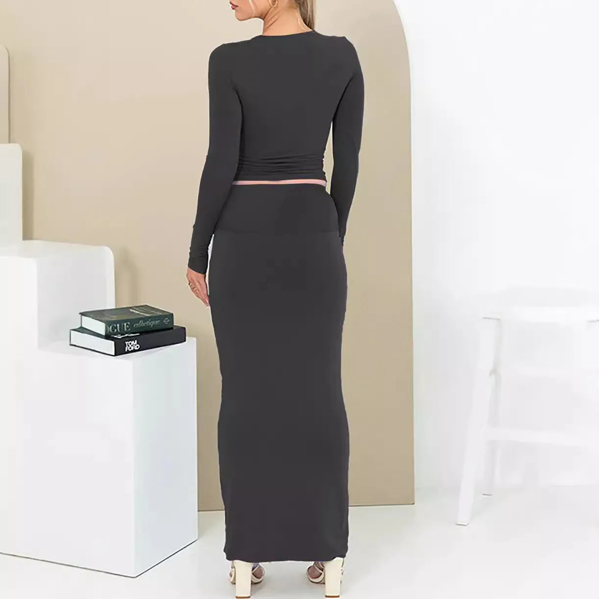 Women's sweet style two-piece suit set with long skirt and three-quarter sleeves in solid colour.
