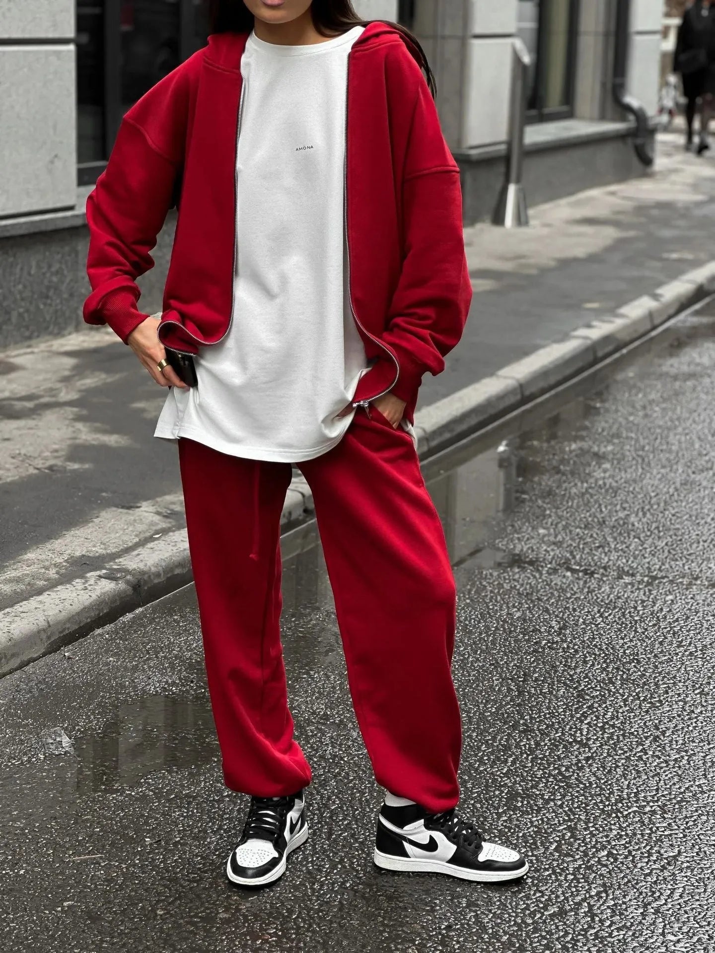 Street style loose-fit two-piece set with long-sleeved coat and trousers in grey.