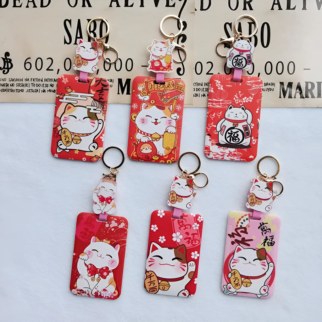 Lucky Cat blessing certificate set showing plastic card sleeve and ferrule pendant in cartoon style.
