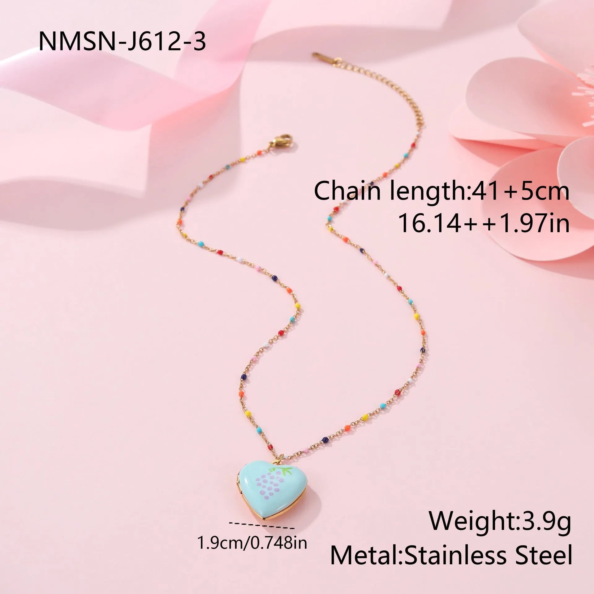Women's stainless steel necklace with 18K gold plating showing heart pendant with fruit designs