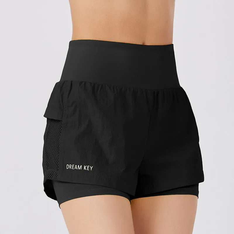 Women's loose casual quick-drying sports shorts in cotton blend fabric on a hanger.