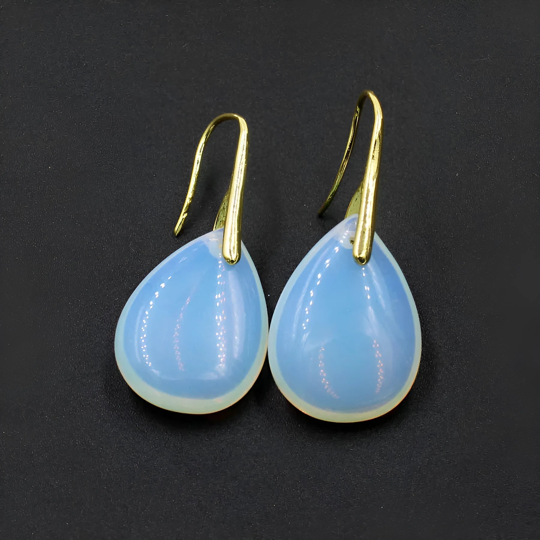 Geometric water droplet crystal earrings in multiple colour options with electroplated metal details