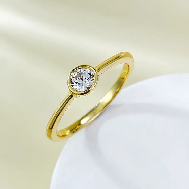 Minimalist crown-shaped silver ring with line detailing, shown in electroplated gold and platinum finishes