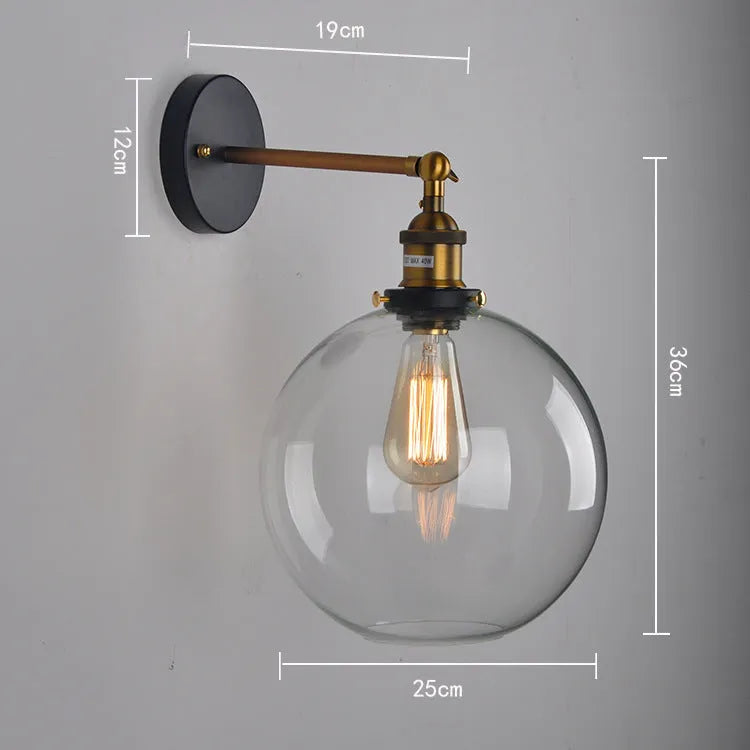 Retro round glass ball wall lamp in amber finish with 20cm diameter and aluminium holder.