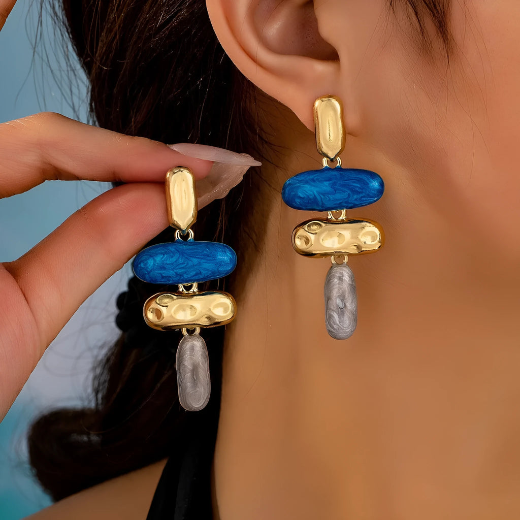 Geometric shaped stud earrings with multicolour electroplated finish on zinc alloy