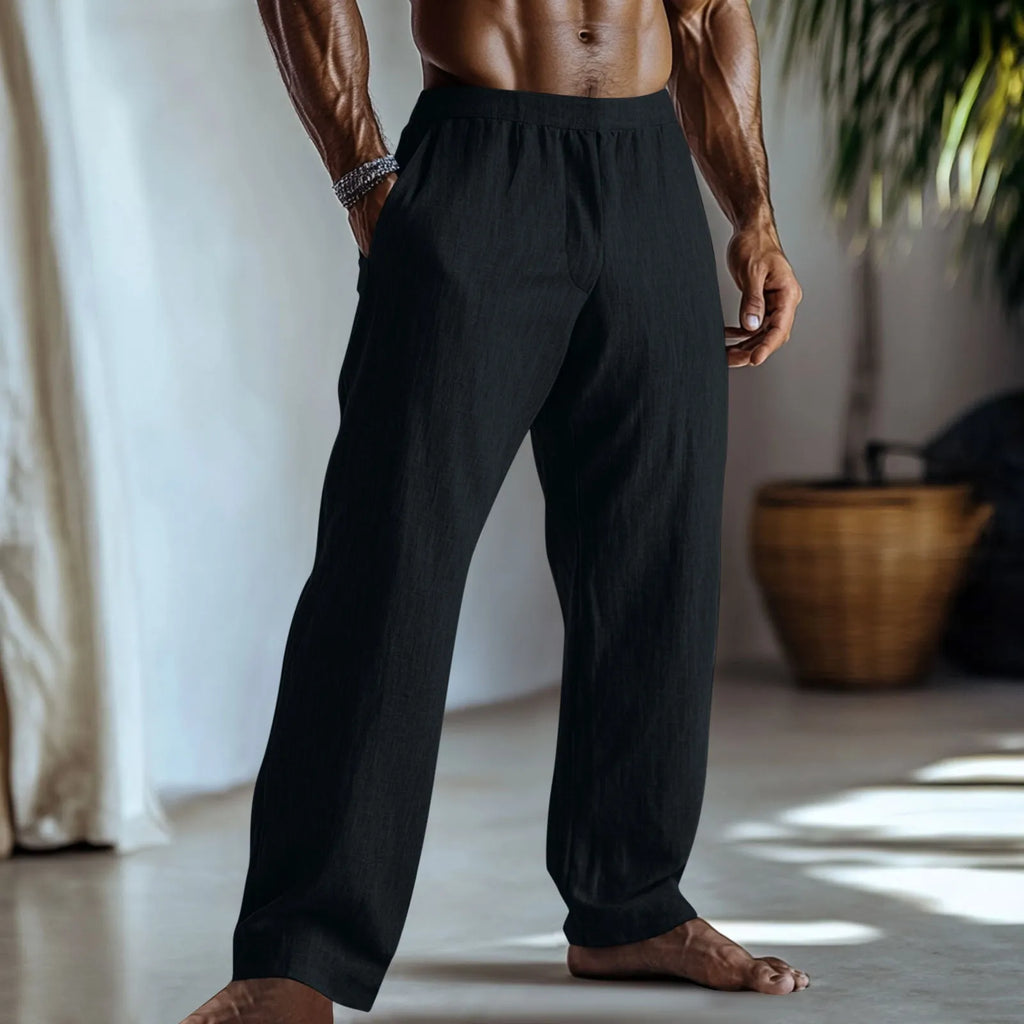 Cotton and linen straight-leg casual trousers in a solid colour with pockets, showing British style fit.