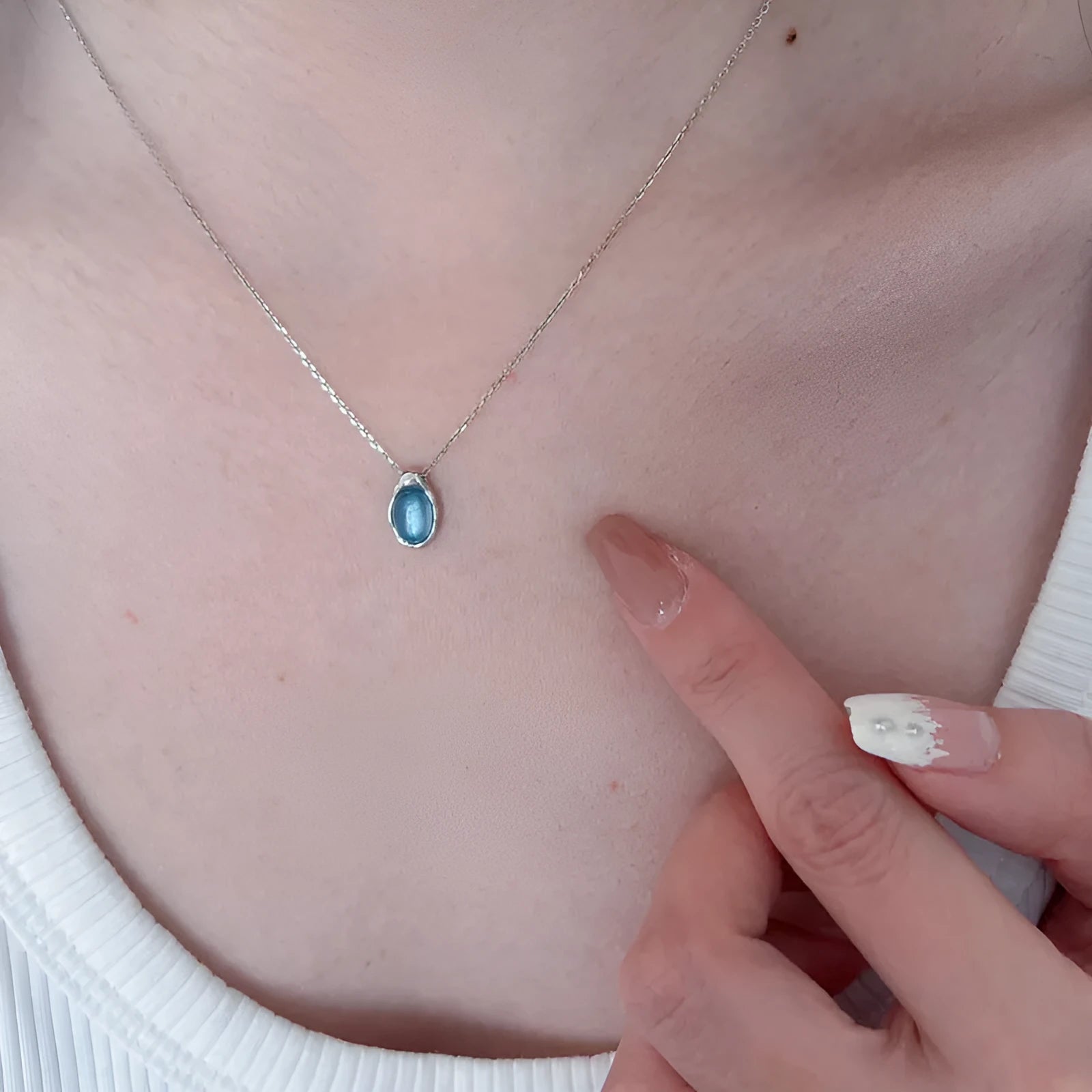 Navy blue water drop geometric pendant on adjustable copper chain with platinum colour finish