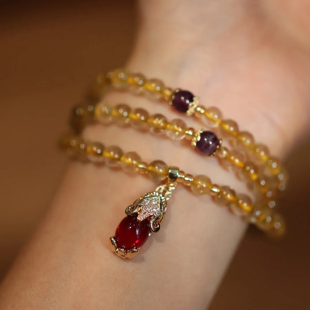 Natural Brazilian gold rutilated quartz bracelet with three gold rings in Chinese style design