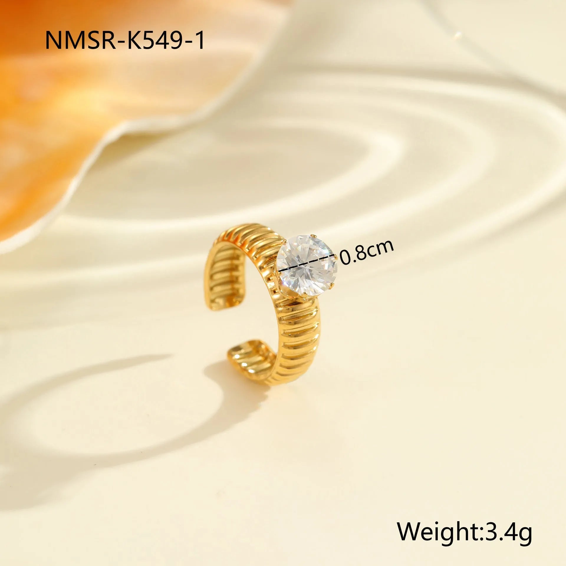 Gold electroplated stainless steel ring with zircon stones and open mouth adjustable design