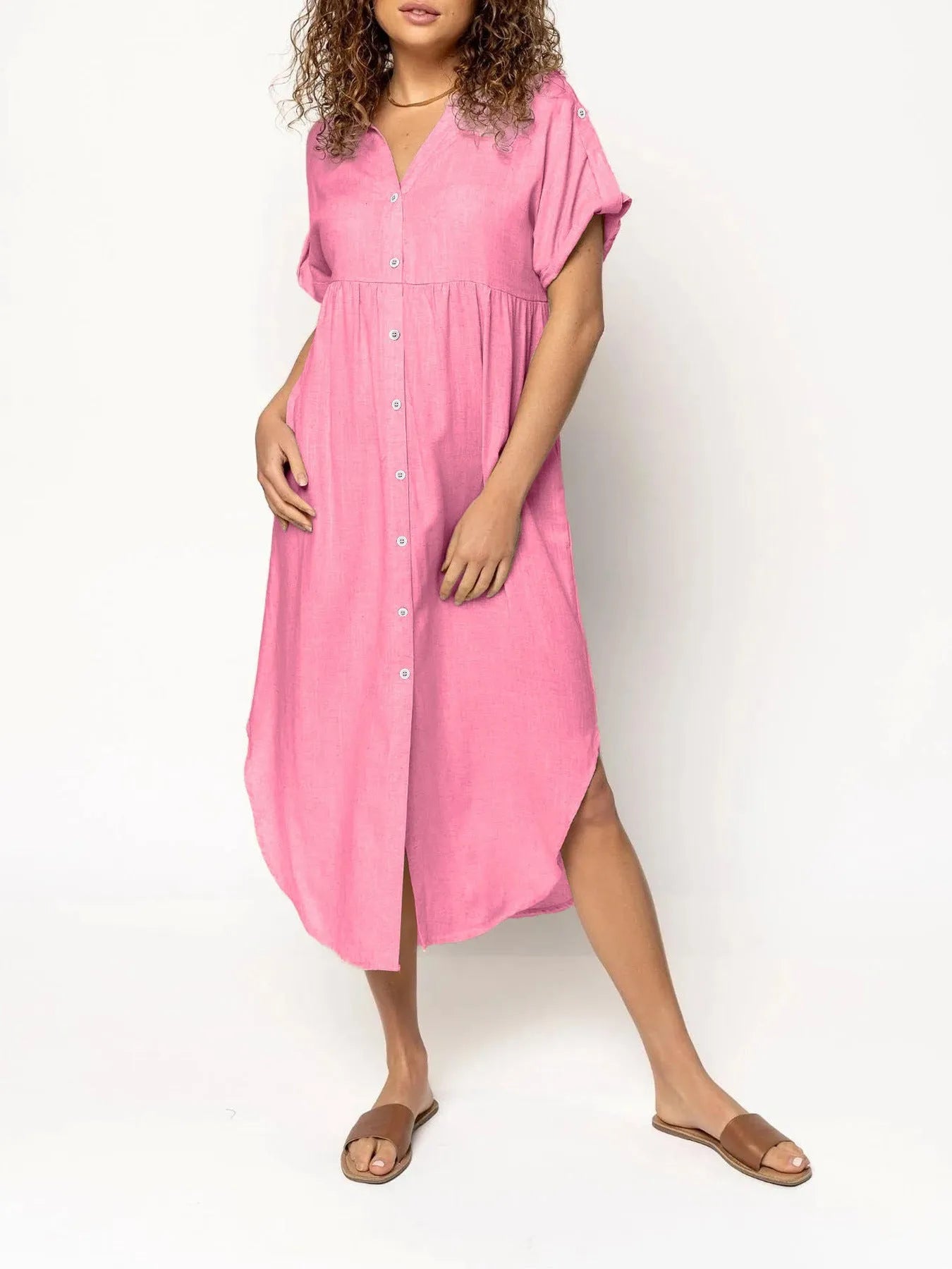 A mid-length casual dress with button detail on the front, shown in a solid colour.
