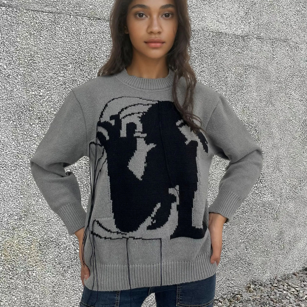 Women's grey alpaca wool sweater with abstract tassel design and round neck