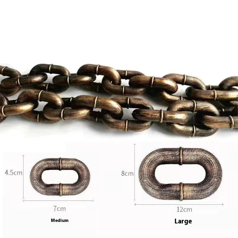 Simulated rough dog leash prop in bronze colour on a plain background