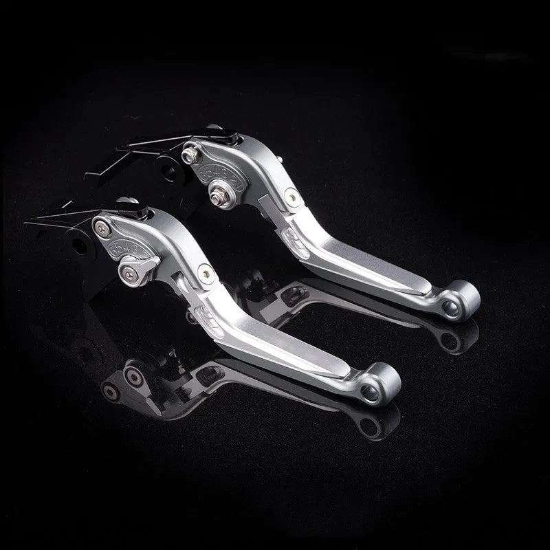 Pair of anodised metal motorcycle horn handle clutch levers with six-speed adjustable length, shown in a selection of colour finishes