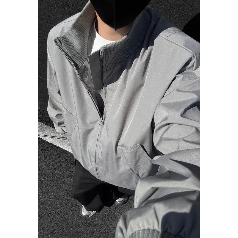 Men's cleanfit short jacket in solid colour polyester with side seam pockets, black colour option