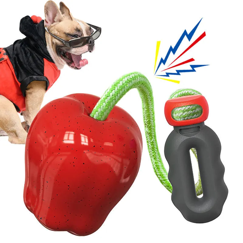 Green plastic dog food dropping ball molar toy with apple design for interactive feeding and chewing