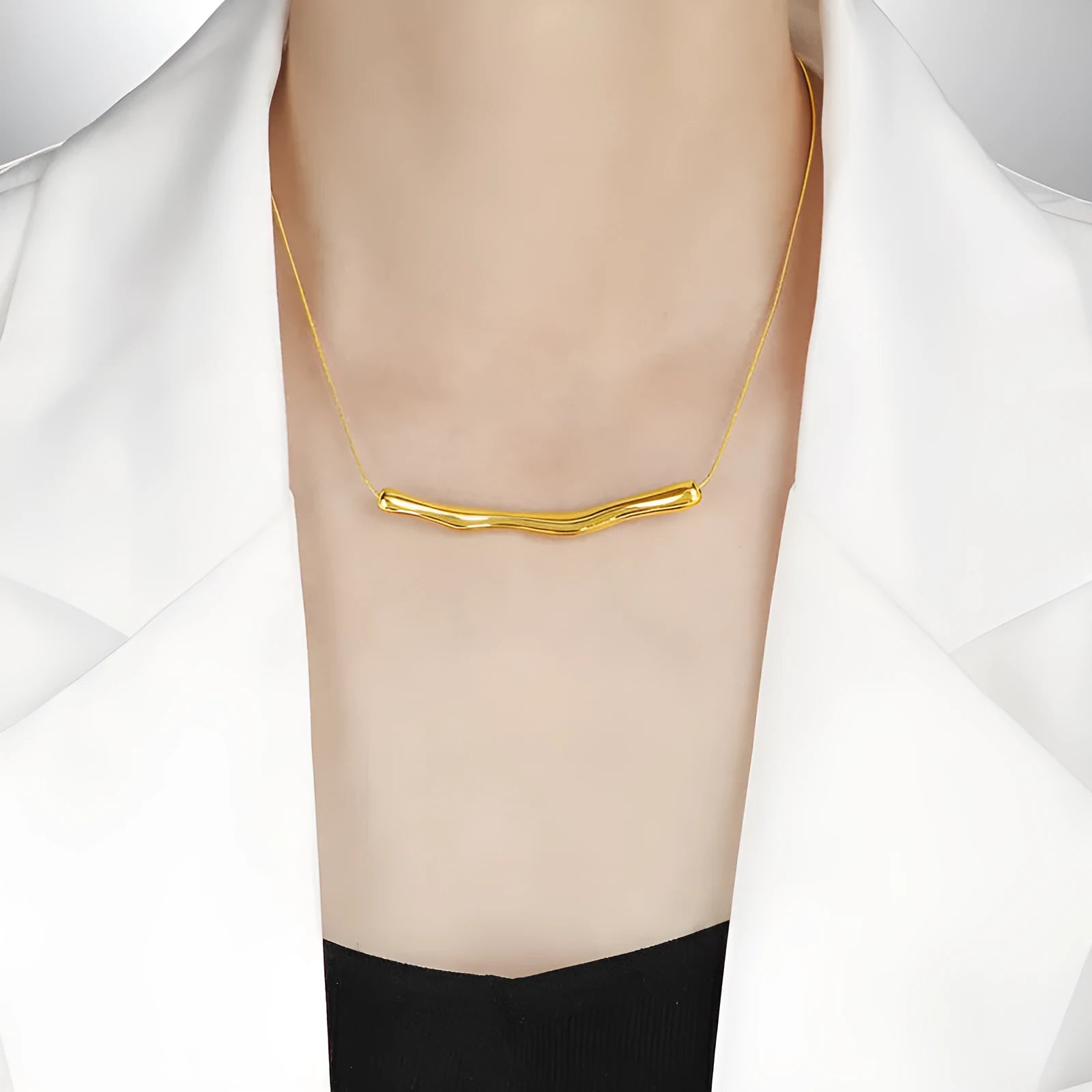 Women's titanium steel necklace with a textured irregular pleated design, shown in gold and steel colour options.