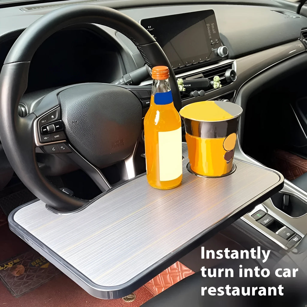 Black foldable car steering wheel tray with laptop and drink cup holder deployed