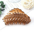 Frosted leaf hairpin side clip with rainbow detail in black colour