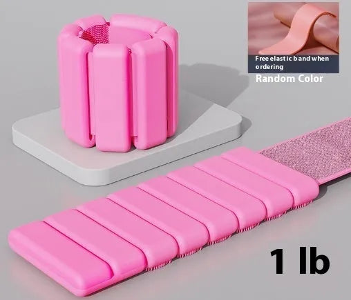 Silicone fitness bracelet with Velcro strap shown in pink, black, grey, and blue colours, with 1lb and 2lb weight options.