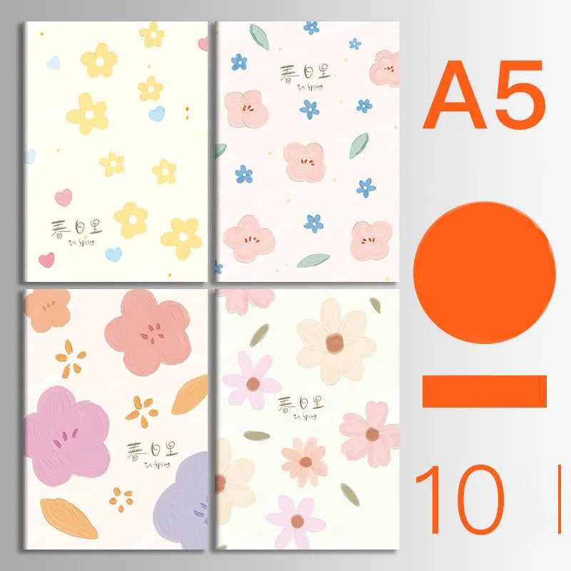 Set of 10 thread-bound softcover notebooks in various designs including kraft paper and printed patterns