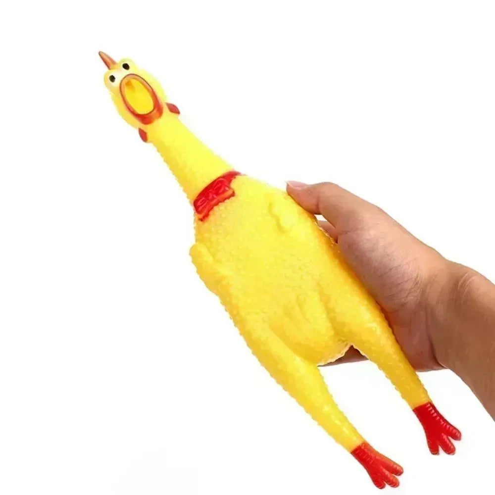 Yellow rubber screaming chicken dog squeak chew toy shown in small, medium, and large sizes.