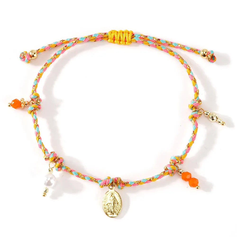 A colourful hand-woven braided rope bracelet with an adjustable strap and tag charm.