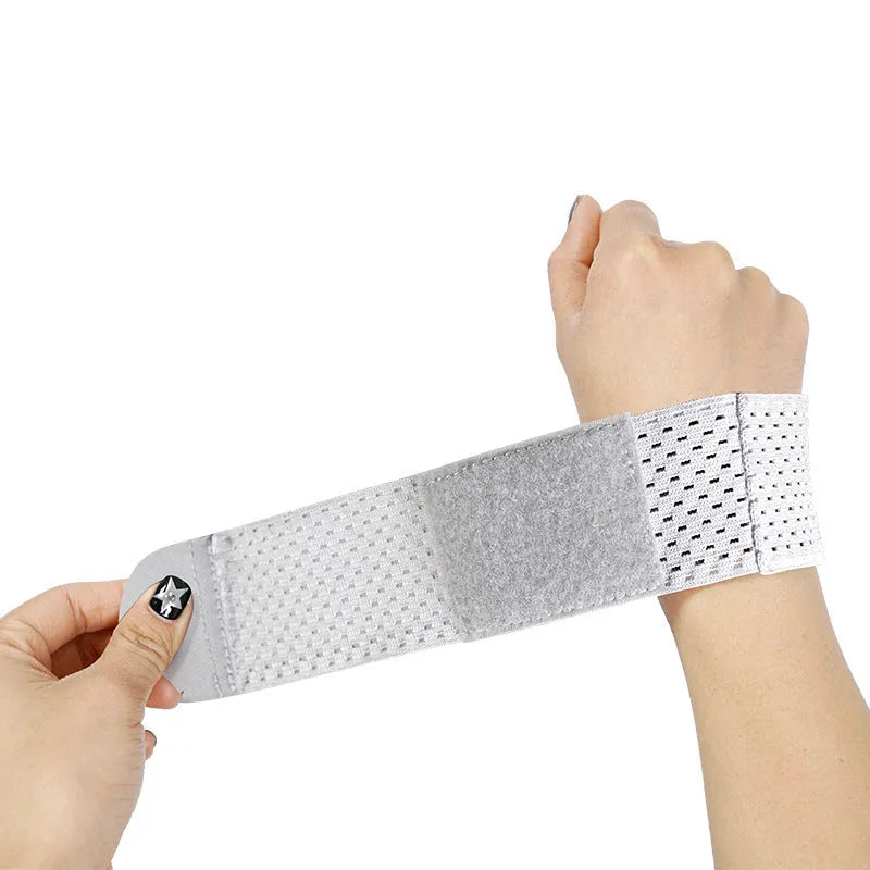 High elastic athletic wristguards in black, grey, and pink colours for sports wrist protection