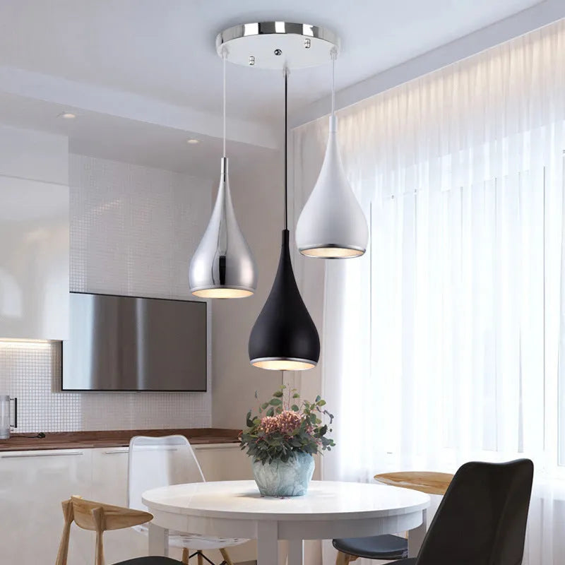 Minimalist iron chandelier ceiling light in black, chrome or white with single head or multi-head disc styles