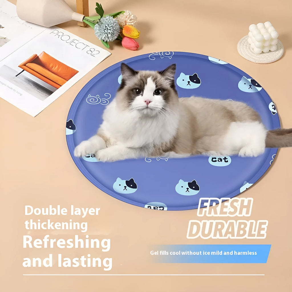 Round pet cooling mat with cartoon animal design showing blue polar bear pattern on cloth surface
