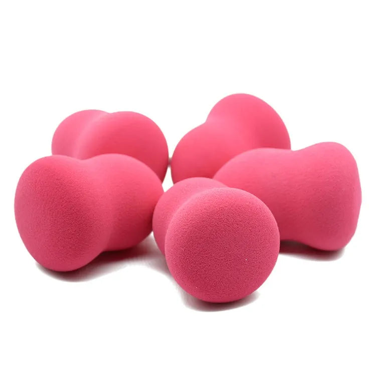 Pink non-latex makeup foundation sponge measuring 4x4x5.6cm