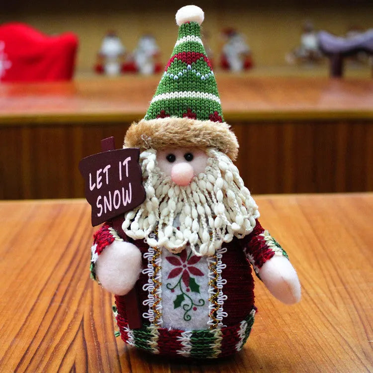 Flannel Christmas decorations set showing Snowman, Old Man, and Elk figures each measuring 18cm by 13cm in red, green, and white