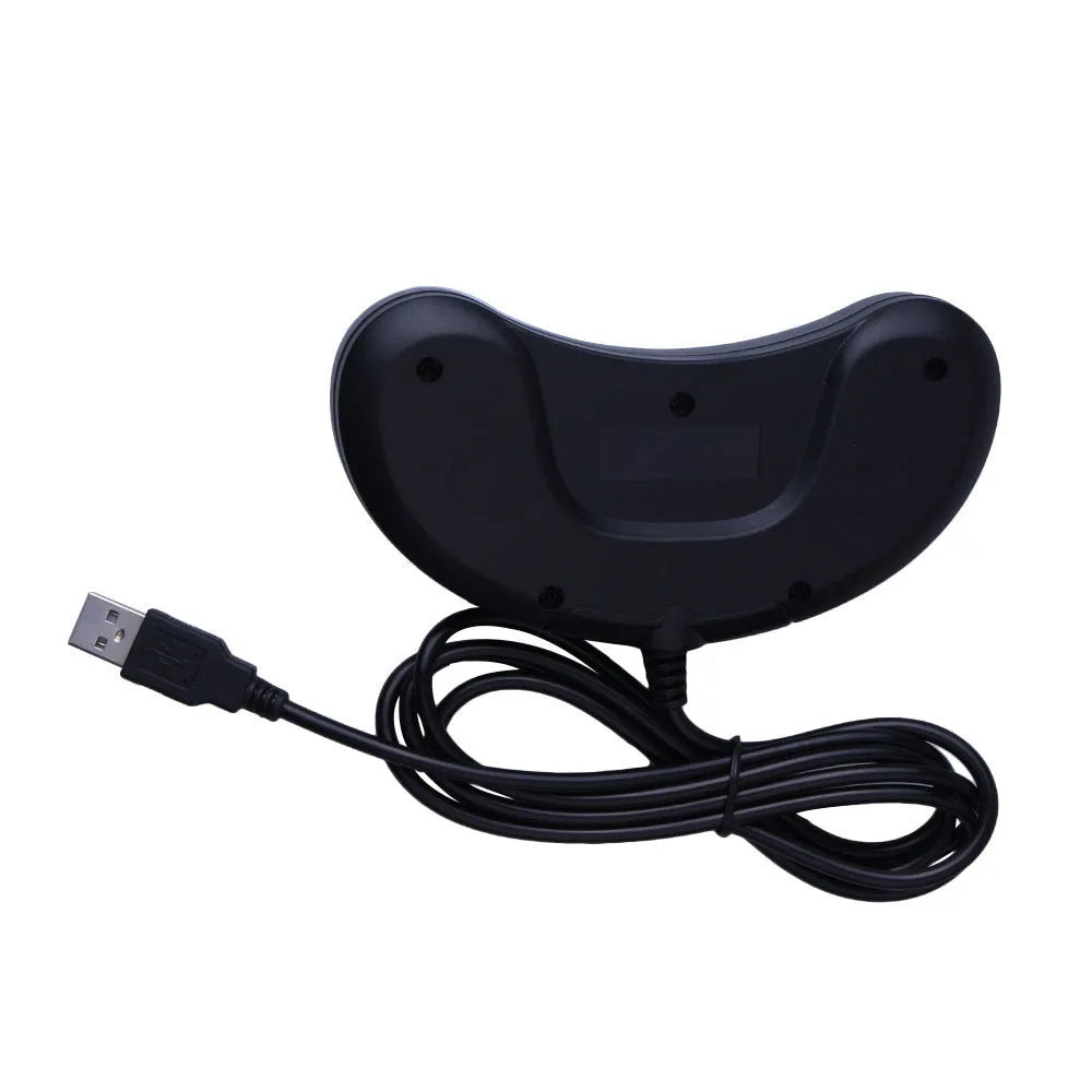 Black Sega USB wired PC game controller with long cable on a grey background.