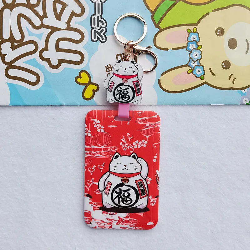 Lucky Cat blessing certificate set showing plastic card sleeve and ferrule pendant in cartoon style.