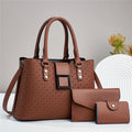 Women's textured three-piece crossbody bag set in PU leather with woven detailing and multiple compartments