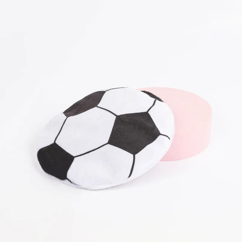 Plush disc cat toy with sports ball pattern containing catnip and crinkle layer