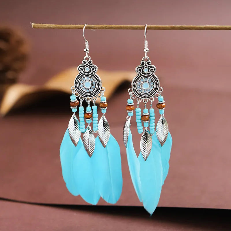 Feather pattern drop earrings with round oil craft design in alloy with electroplated finish