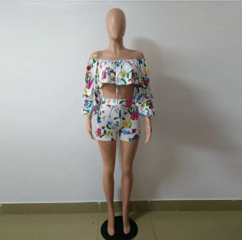 Multicolour digitally printed women's two-piece lounge set with pile sleeves and shorts.