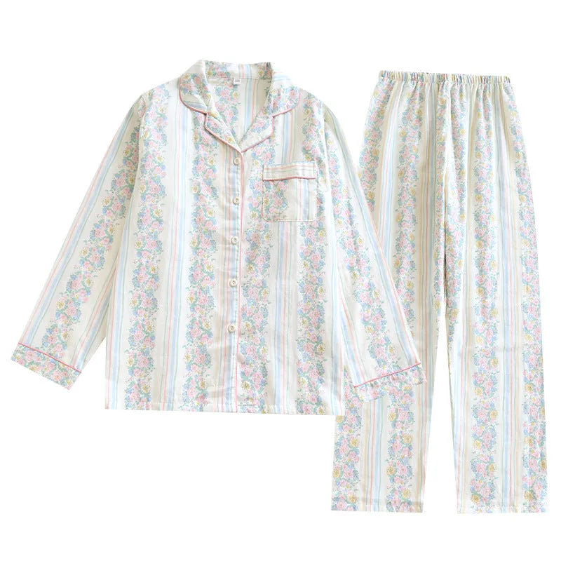 Women's striped cotton gauze long-sleeved top and matching trousers two-piece lounge set laid flat.