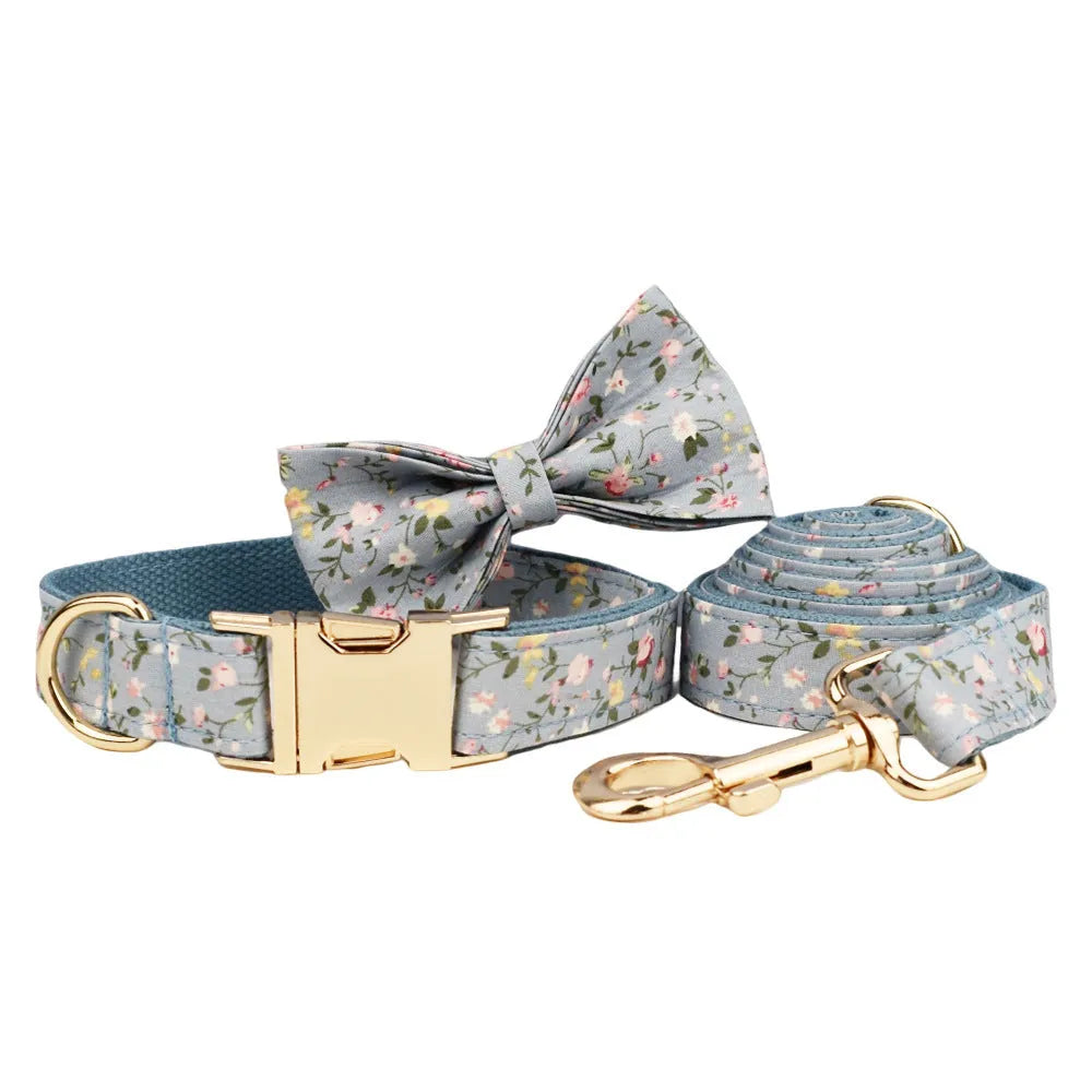 Blue floral polyester cotton dog collar set with matching leash, bow tie and vest accessories