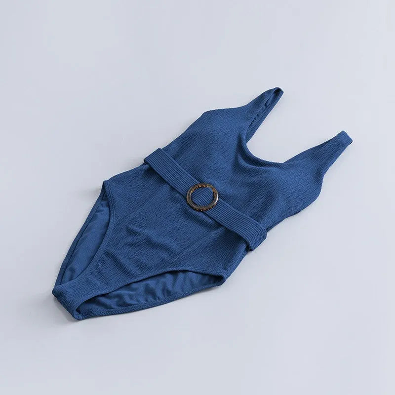 Navy blue women's one-piece slimming triangle swimsuit with a removable chest pad.